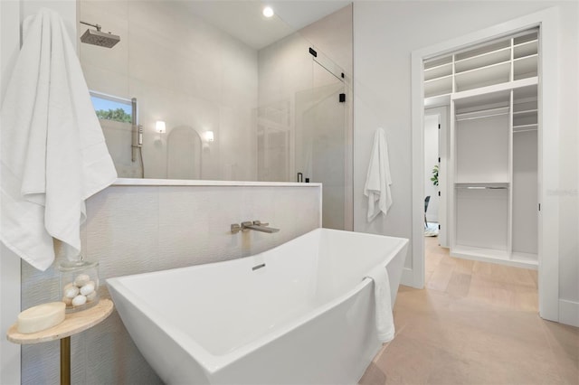 2218 S Occident St, Tampa, FL 33629 - full bath with a soaking tub, a stall shower, and recessed lighting