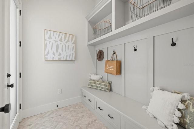 2218 S Occident St, Tampa, FL 33629 - mudroom featuring baseboards and a towering ceiling