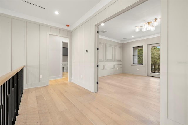 2218 S Occident St, Tampa, FL 33629 - interior space with a decorative wall, light wood-style floors, recessed lighting, baseboards, and ornamental molding