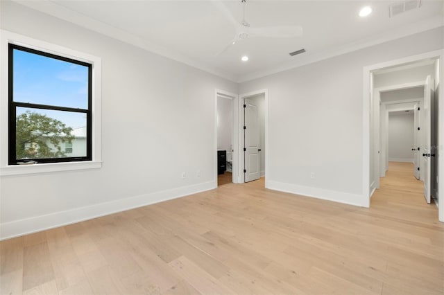 2218 S Occident St, Tampa, FL 33629 - unfurnished bedroom with visible vents, baseboards, and light wood-type flooring