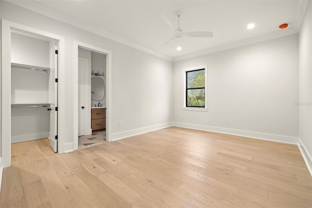 2218 S Occident St, Tampa, FL 33629 - unfurnished bedroom with recessed lighting, baseboards, light wood-type flooring, a spacious closet, and ornamental molding