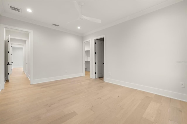 2218 S Occident St, Tampa, FL 33629 - unfurnished bedroom featuring crown molding, baseboards, light wood finished floors, and visible vents