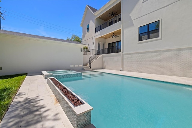 2218 S Occident St, Tampa, FL 33629 - view of swimming pool with stairs, ceiling fan, and a pool with connected hot tub