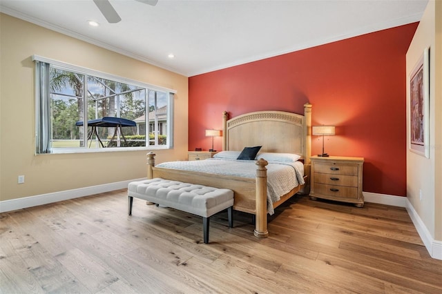 bedroom featuring crown molding, ceiling fan, recessed lighting, baseboards, and wood finished floors