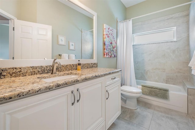 full bathroom featuring vanity, tile patterned floors, shower / bath combo, and toilet