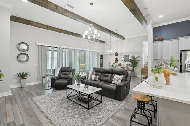 21746 Amelia Rose Way, Land O Lakes, FL 34637 - living area with baseboards, beamed ceiling, light wood-type flooring, and a chandelier
