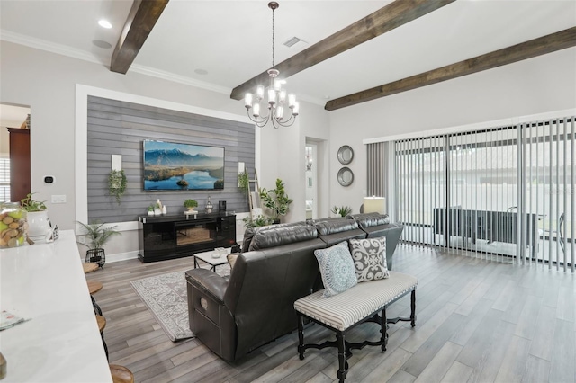 21746 Amelia Rose Way, Land O Lakes, FL 34637 - living room with wood finished floors, a notable chandelier, plenty of natural light, and beam ceiling