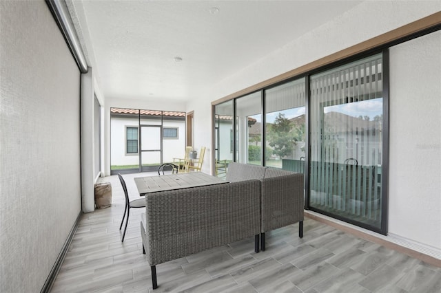 21746 Amelia Rose Way, Land O Lakes, FL 34637 - sunroom with outdoor dining area