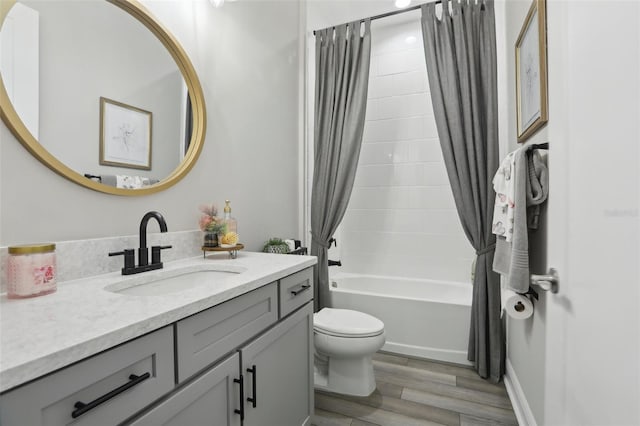 21746 Amelia Rose Way, Land O Lakes, FL 34637 - full bath with vanity, shower / tub combo, wood finished floors, and toilet