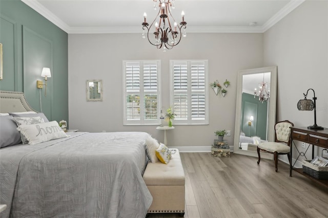 21746 Amelia Rose Way, Land O Lakes, FL 34637 - bedroom with ornamental molding, a notable chandelier, and wood finished floors