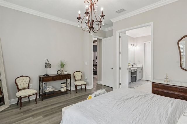 21746 Amelia Rose Way, Land O Lakes, FL 34637 - bedroom featuring visible vents, crown molding, a sink, light wood finished floors, and a notable chandelier