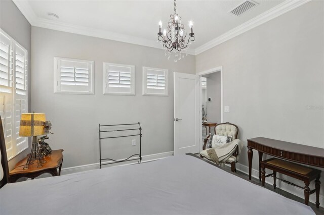 21746 Amelia Rose Way, Land O Lakes, FL 34637 - bedroom with crown molding, a chandelier, baseboards, and visible vents