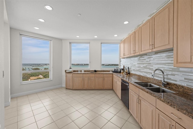 1170 Gulf Blvd Unit 2101, Clearwater Beach, FL 33767 - kitchen with light brown cabinets, a sink, black dishwasher, recessed lighting, and decorative backsplash