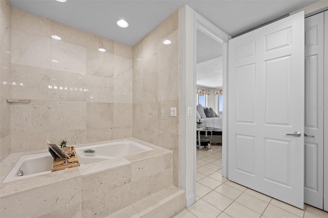 1170 Gulf Blvd Unit 2101, Clearwater Beach, FL 33767 - ensuite bathroom featuring tile patterned floors, a bath, tile walls, and recessed lighting