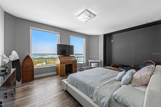 1170 Gulf Blvd Unit 2101, Clearwater Beach, FL 33767 - bedroom with wood finished floors and baseboards