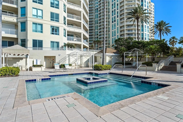 1170 Gulf Blvd Unit 2101, Clearwater Beach, FL 33767 - community pool featuring a patio, a community hot tub, and a gazebo