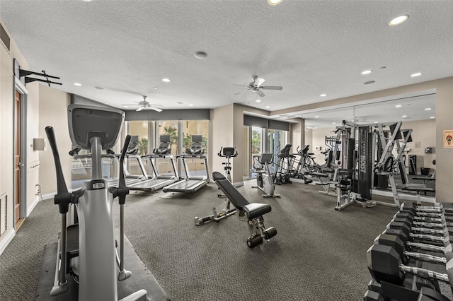 1170 Gulf Blvd Unit 2101, Clearwater Beach, FL 33767 - exercise room with ceiling fan, recessed lighting, a textured ceiling, and baseboards