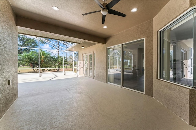 10517 Palm Cove Ave, Tampa, FL 33647 - view of patio with a ceiling fan and glass enclosure