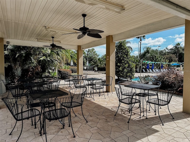 10517 Palm Cove Ave, Tampa, FL 33647 - view of patio with a ceiling fan and outdoor dining space