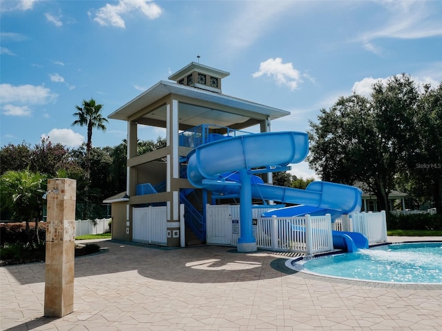 10517 Palm Cove Ave, Tampa, FL 33647 - exterior space with fence, a water slide, a patio, and playground community