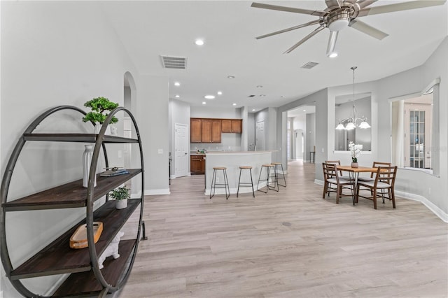 10517 Palm Cove Ave, Tampa, FL 33647 - interior space with visible vents, baseboards, and light wood-type flooring