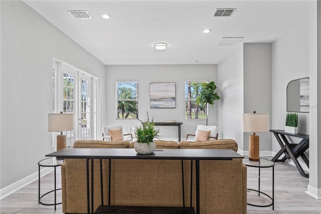 10517 Palm Cove Ave, Tampa, FL 33647 - interior space featuring recessed lighting, baseboards, light wood finished floors, and visible vents