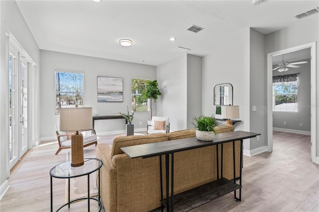 10517 Palm Cove Ave, Tampa, FL 33647 - interior space featuring baseboards, light wood-type flooring, and visible vents