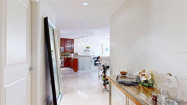 hall featuring recessed lighting