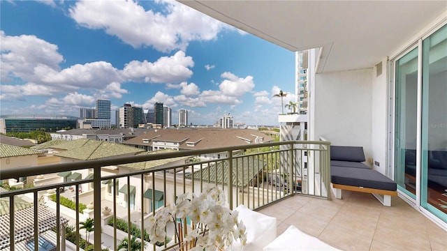 balcony with a view of city and visible vents