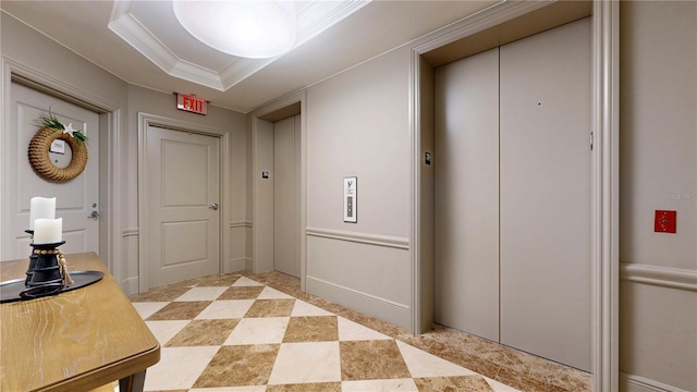 hall featuring crown molding and elevator
