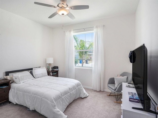 5464 Flint Hills Dr, Wimauma, FL 33598 - carpeted bedroom with baseboards and ceiling fan