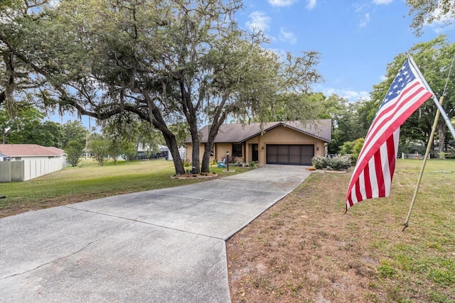 7120 N Croton Pt, Hernando, FL 34442 - ranch-style house with fence, an attached garage, driveway, and a front yard