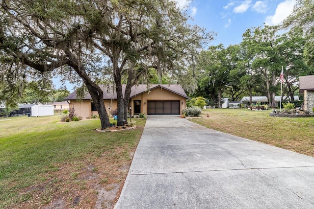 7120 N Croton Pt, Hernando, FL 34442 - view of front of house with a garage, driveway, and a front lawn