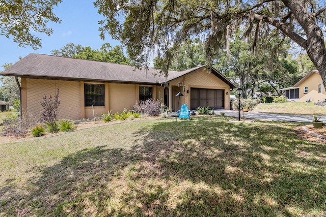 7120 N Croton Pt, Hernando, FL 34442 - single story home with an attached garage, concrete driveway, and a front yard