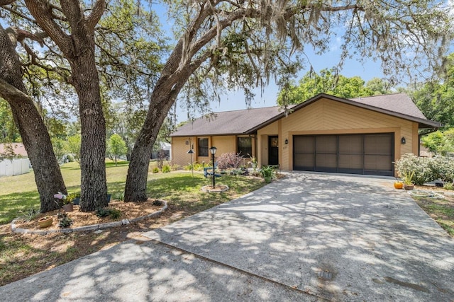 7120 N Croton Pt, Hernando, FL 34442 - ranch-style house featuring an attached garage, a front lawn, and concrete driveway