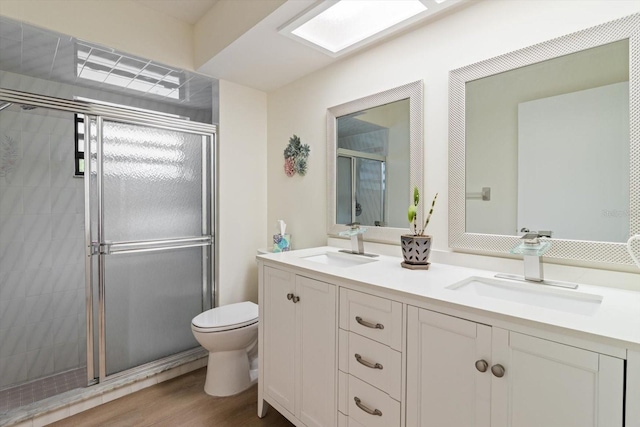 7120 N Croton Pt, Hernando, FL 34442 - full bathroom with double vanity, a sink, a stall shower, and toilet