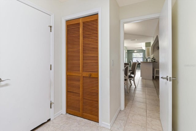 7120 N Croton Pt, Hernando, FL 34442 - hallway with light tile patterned floors and baseboards