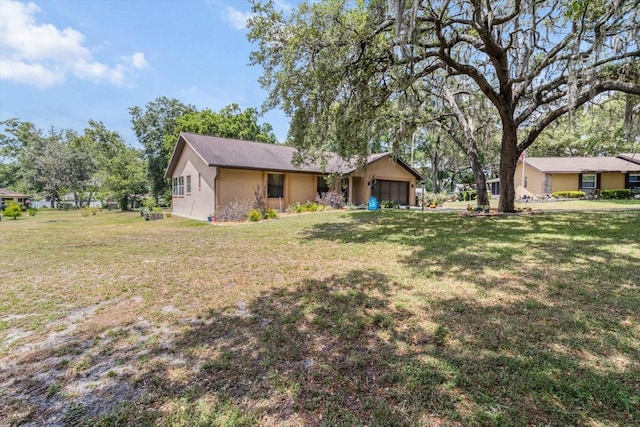 7120 N Croton Pt, Hernando, FL 34442 - view of yard with a garage
