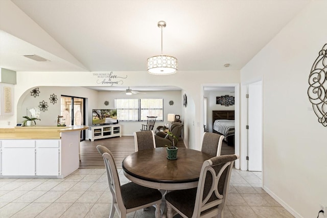 7120 N Croton Pt, Hernando, FL 34442 - dining area with ceiling fan, arched walkways, baseboards, light tile patterned floors, and visible vents