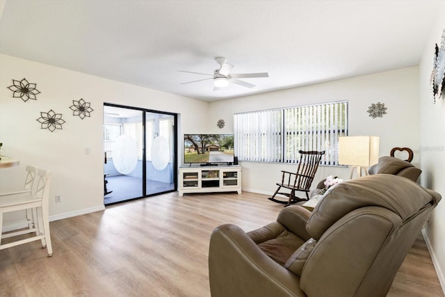 7120 N Croton Pt, Hernando, FL 34442 - living area with light wood-type flooring, a ceiling fan, and a wealth of natural light