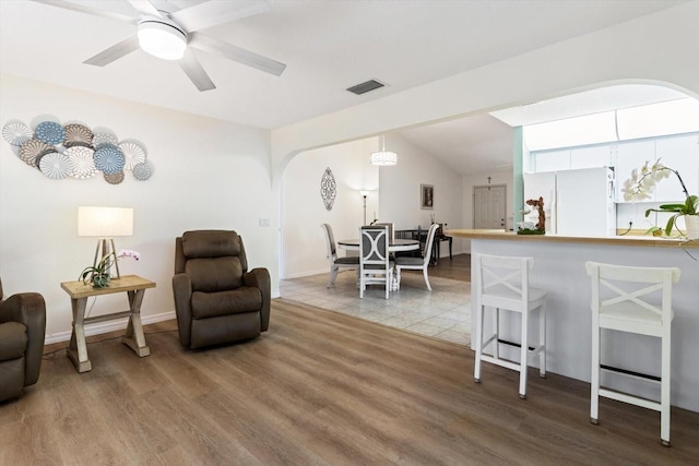 7120 N Croton Pt, Hernando, FL 34442 - living area featuring arched walkways, ceiling fan, wood finished floors, and visible vents
