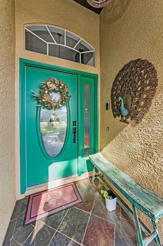 12923 Colony Rd, Hudson, FL 34669 - property entrance with stucco siding