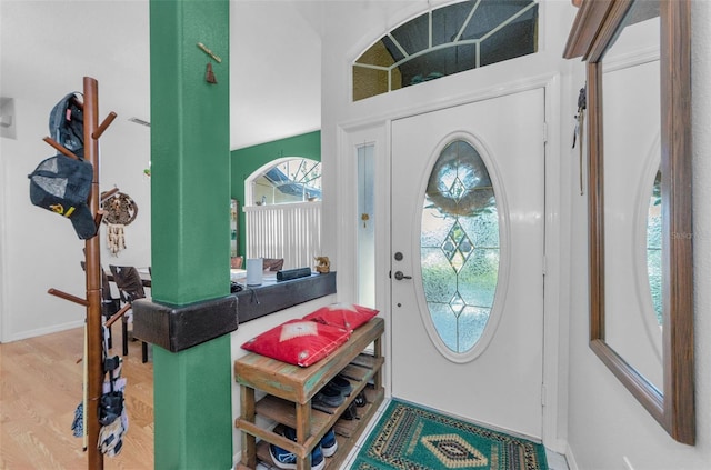 12923 Colony Rd, Hudson, FL 34669 - foyer entrance featuring baseboards and wood finished floors