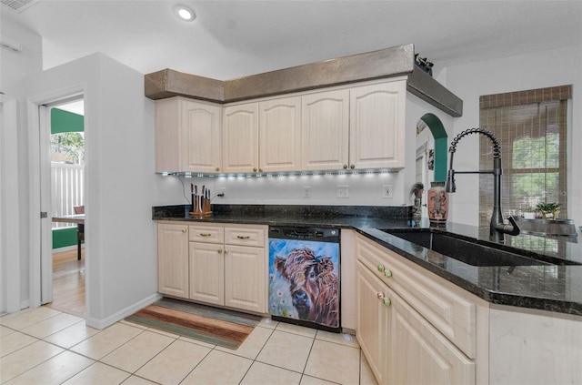 12923 Colony Rd, Hudson, FL 34669 - kitchen featuring a sink, dishwasher, dark stone counters, recessed lighting, and light tile patterned floors