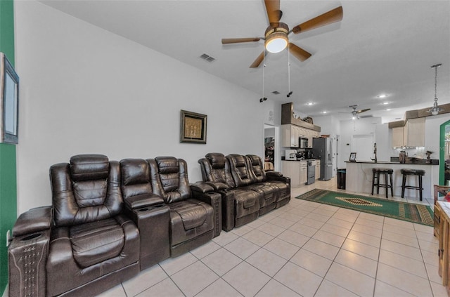 12923 Colony Rd, Hudson, FL 34669 - cinema room with visible vents, a ceiling fan, light tile patterned floors, and recessed lighting