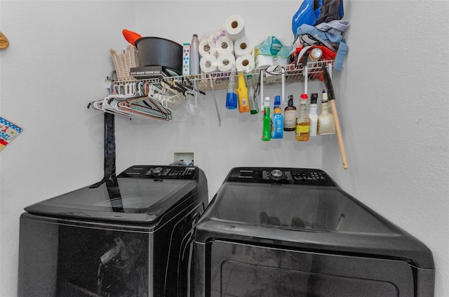 12923 Colony Rd, Hudson, FL 34669 - clothes washing area with independent washer and dryer and laundry area