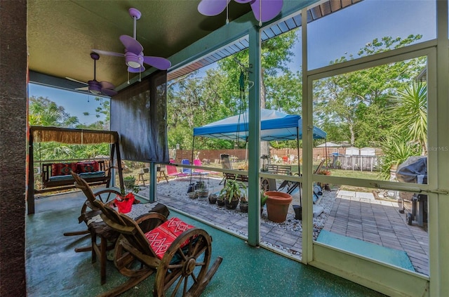 12923 Colony Rd, Hudson, FL 34669 - sunroom / solarium featuring a ceiling fan and a wealth of natural light