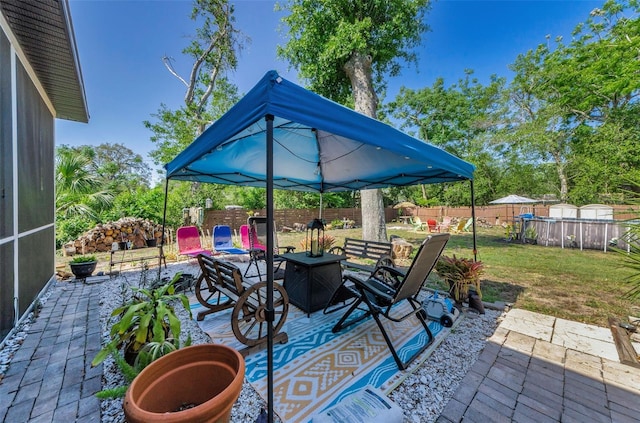 12923 Colony Rd, Hudson, FL 34669 - view of patio with a fenced backyard and outdoor dining space