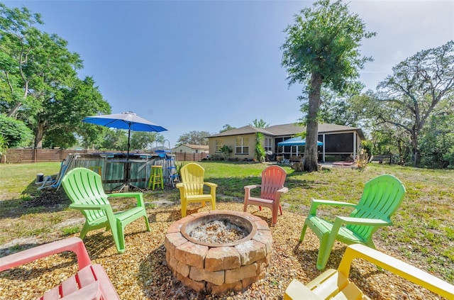 12923 Colony Rd, Hudson, FL 34669 - view of patio / terrace with fence and an outdoor fire pit