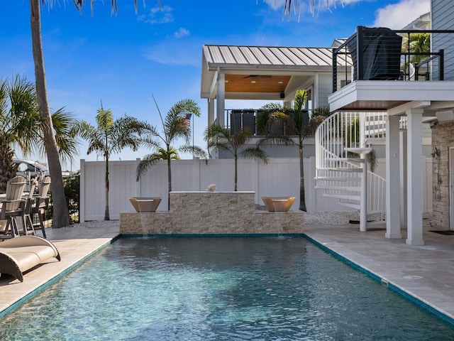 view of pool featuring fence, a patio area, and a fenced in pool